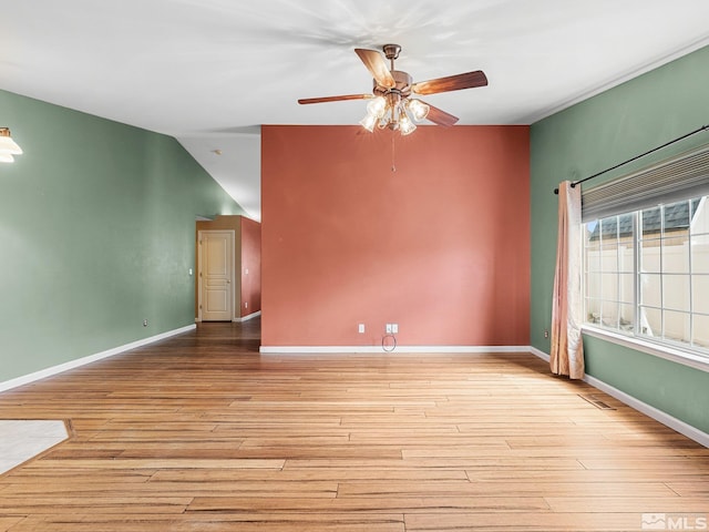 1343 White Bluffs Cir, Fernley, NV 89408 - empty room featuring a ceiling fan, wood finished floors, and baseboards