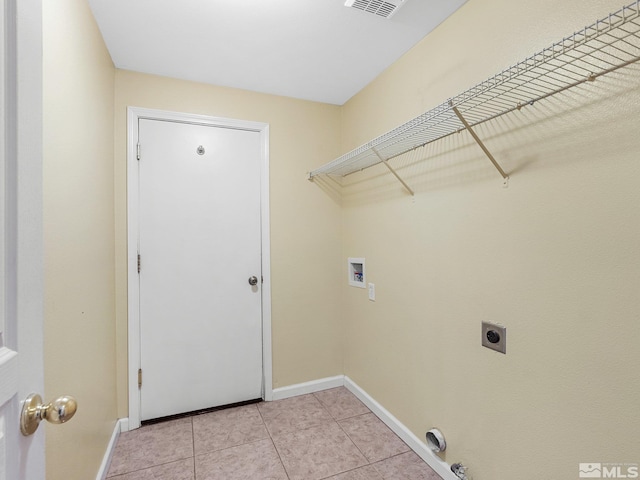 1343 White Bluffs Cir, Fernley, NV 89408 - laundry room with hookup for a washing machine, baseboards, light tile patterned floors, and electric dryer hookup