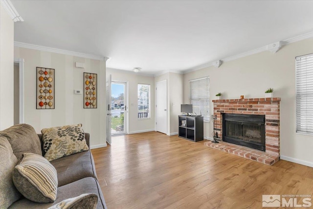 1280 O Callaghan Dr, Sparks, NV 89434 - living area featuring crown molding, wood finished floors, a fireplace, and baseboards