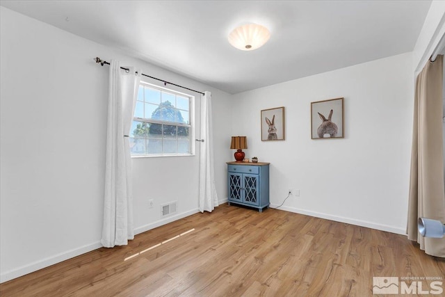 1280 O Callaghan Dr, Sparks, NV 89434 - empty room with light wood-type flooring and baseboards