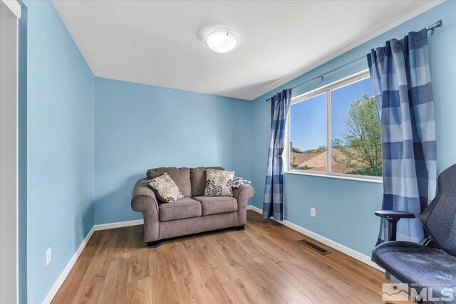 1280 O Callaghan Dr, Sparks, NV 89434 - living area with light wood finished floors and baseboards