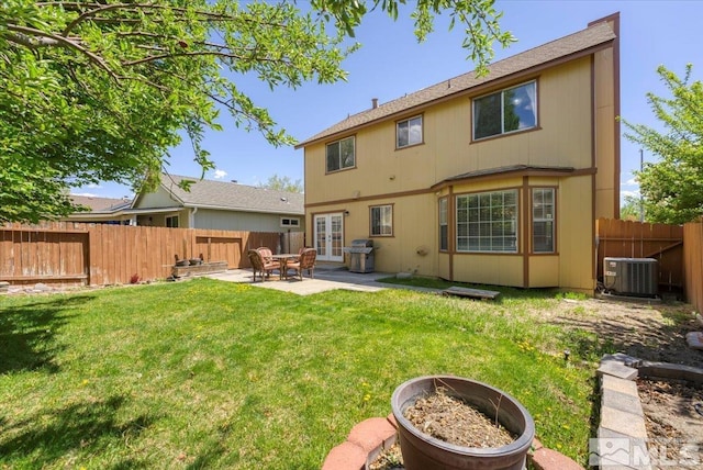 1280 O Callaghan Dr, Sparks, NV 89434 - rear view of property featuring french doors, a patio area, an outdoor fire pit, and central air condition unit