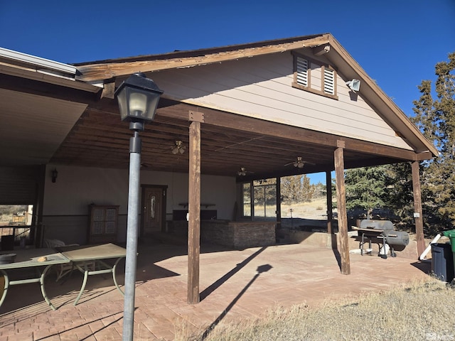 1250 Columbia Hill Rd, Reno, NV 89508 - view of patio with a ceiling fan and a grill