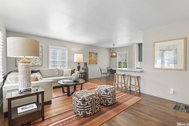 823 Arbutus St, Reno, NV 89509 - living room with wood finished floors and baseboards
