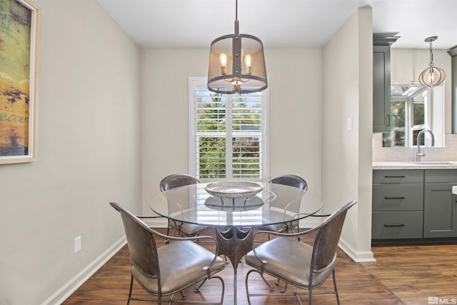 823 Arbutus St, Reno, NV 89509 - dining room with dark wood finished floors, healthy amount of natural light, and baseboards