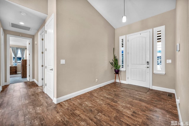 16885 Majestic View Dr, Reno, NV 89521 - foyer entrance featuring wood finished floors, baseboards, and vaulted ceiling