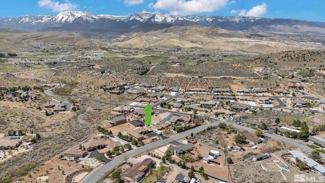 16885 Majestic View Dr, Reno, NV 89521 - aerial view of property and surrounding area with a mountainous background and nearby suburban area