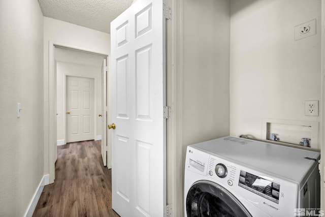 2375 Tripp Dr Unit 2, Reno, NV 89512 - laundry area featuring washer / clothes dryer, dark wood-style floors, a textured ceiling, and baseboards