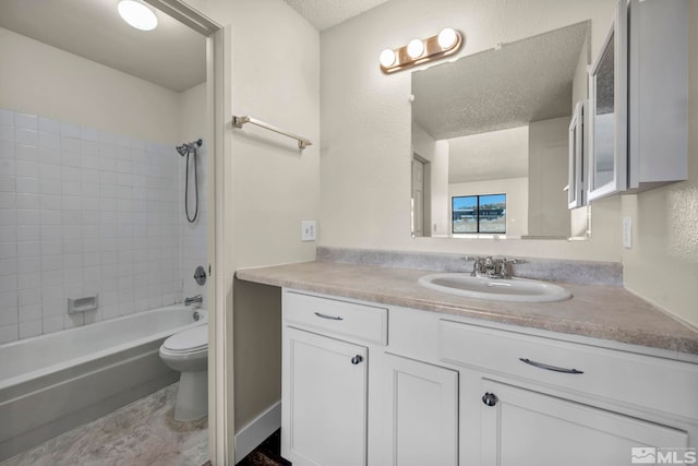 2375 Tripp Dr Unit 2, Reno, NV 89512 - bathroom with vanity, toilet, a textured ceiling, and shower / bathtub combination