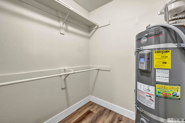 2375 Tripp Dr Unit 2, Reno, NV 89512 - spacious closet featuring strapped water heater and dark wood-style flooring