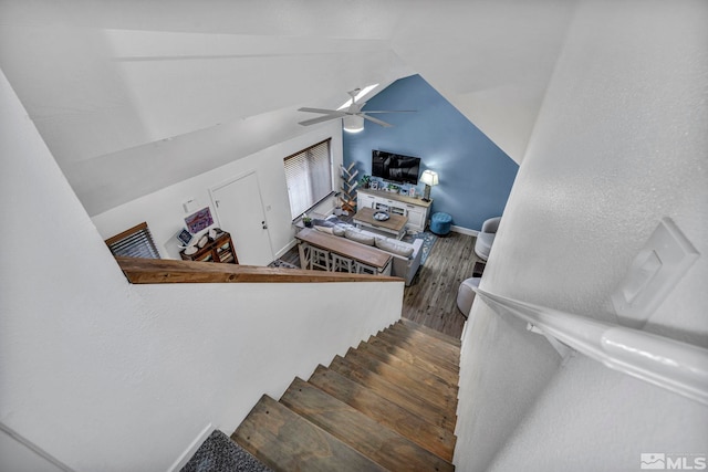 40 Condor Cir, Carson City, NV 89701 - stairs featuring ceiling fan, wood finished floors, lofted ceiling, and baseboards