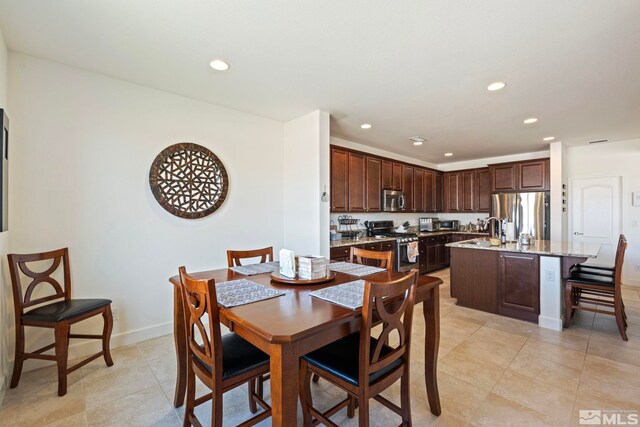 1845 Fledge Creek Dr, Reno, NV 89521 - dining room featuring recessed lighting, light tile patterned floors, and baseboards