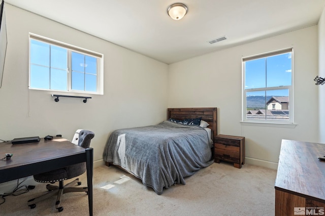 1845 Fledge Creek Dr, Reno, NV 89521 - bedroom with multiple windows, carpet, baseboards, and a desk