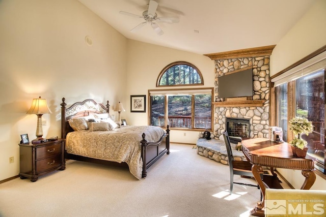 1300 Douglas Fir Dr, Reno, NV 89511 - carpeted bedroom with lofted ceiling, a fireplace, and baseboards
