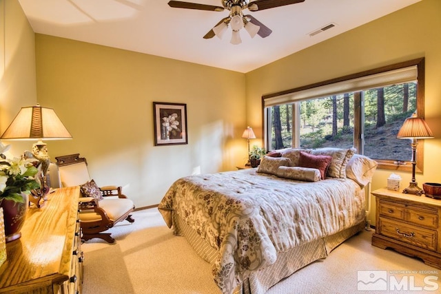 1300 Douglas Fir Dr, Reno, NV 89511 - bedroom with light colored carpet and ceiling fan