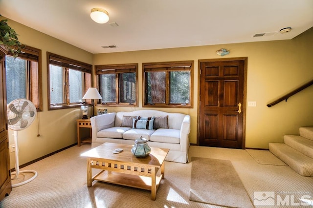 1300 Douglas Fir Dr, Reno, NV 89511 - living room featuring light carpet, stairway, and baseboards