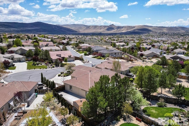 aerial perspective of suburban area with mountains