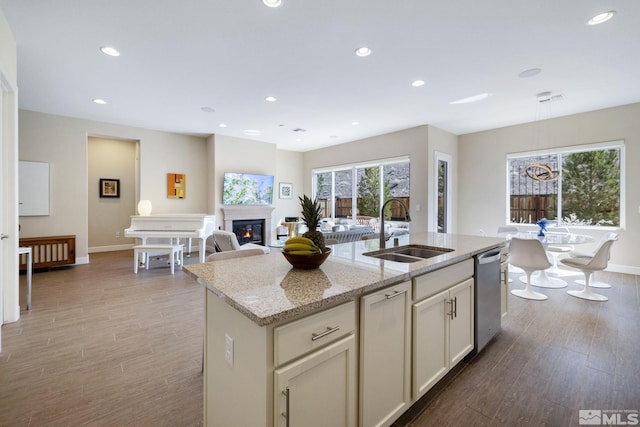 3335 Show Jumper, Reno, NV 89521 - kitchen with a sink, dishwasher, healthy amount of natural light, wood finished floors, and recessed lighting