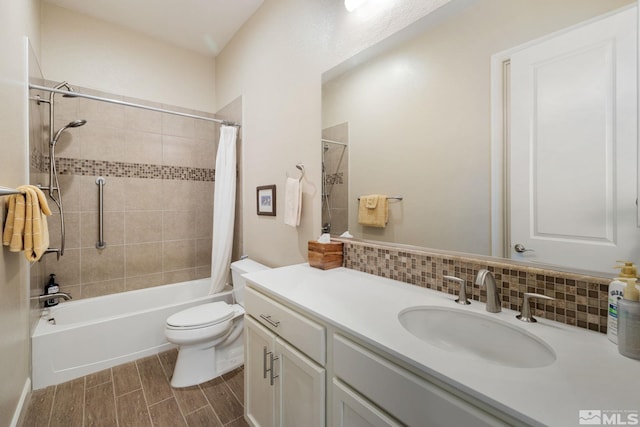 3335 Show Jumper, Reno, NV 89521 - full bathroom with decorative backsplash, shower / tub combo with curtain, toilet, vanity, and wood finished floors
