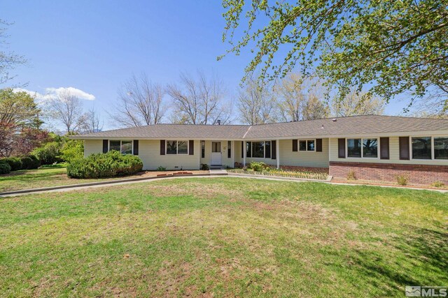 9499 Wigwam Way, Reno, NV 89506 - ranch-style home with a front lawn