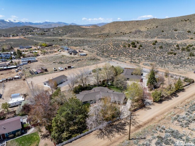 9499 Wigwam Way, Reno, NV 89506 - aerial view of property and surrounding area with a desert landscape, a mountainous background, and rural landscape