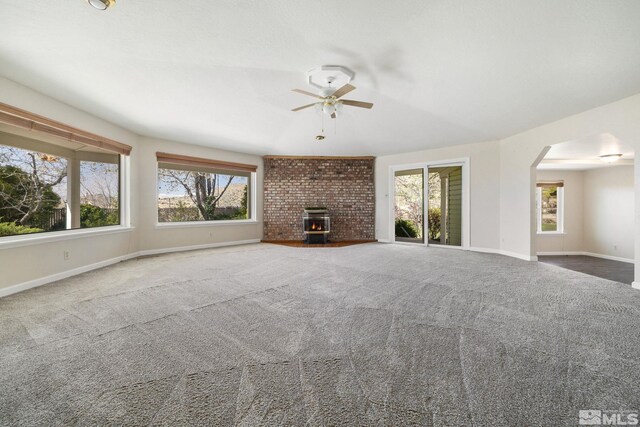 9499 Wigwam Way, Reno, NV 89506 - unfurnished living room featuring baseboards, a ceiling fan, and plenty of natural light
