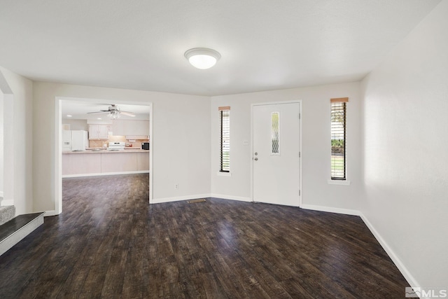 9499 Wigwam Way, Reno, NV 89506 - entryway featuring dark wood-style flooring, plenty of natural light, and baseboards