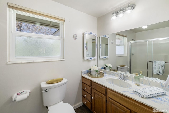 9499 Wigwam Way, Reno, NV 89506 - full bath featuring toilet, a stall shower, vanity, and baseboards