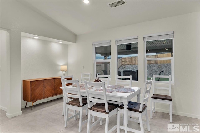 286 Greywall Ct, Dayton, NV 89403 - dining area featuring lofted ceiling, baseboards, a glass covered fireplace, and recessed lighting