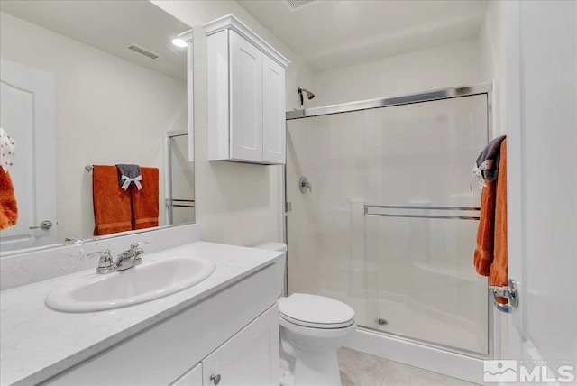 286 Greywall Ct, Dayton, NV 89403 - bathroom featuring a stall shower, vanity, toilet, and tile patterned flooring