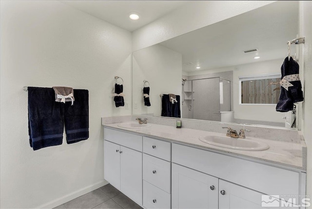 286 Greywall Ct, Dayton, NV 89403 - full bathroom with tile patterned flooring, a shower stall, and double vanity