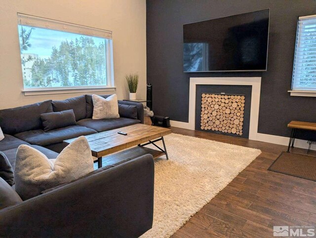 416 Quaking Aspen Ln Unit P, Stateline, NV 89449 - living room with wood finished floors, healthy amount of natural light, and baseboards