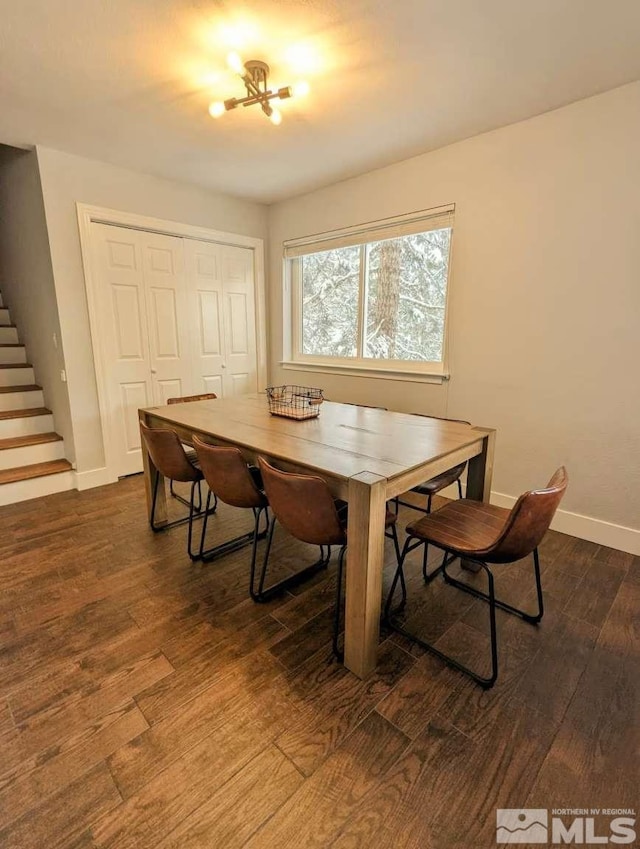 416 Quaking Aspen Ln Unit P, Stateline, NV 89449 - dining area with dark wood finished floors, baseboards, stairs, and a chandelier