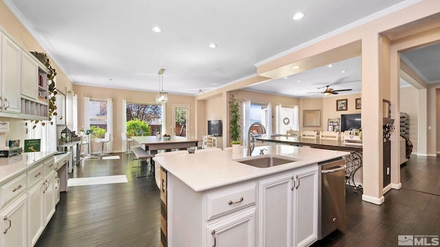 2485 Firenze Dr, Sparks, NV 89434 - kitchen with a sink, a center island with sink, light countertops, recessed lighting, and ceiling fan