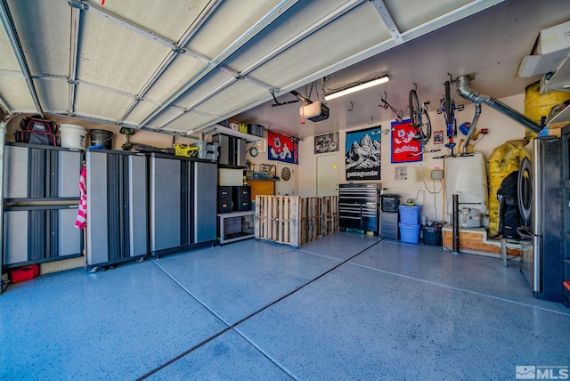 2485 Firenze Dr, Sparks, NV 89434 - garage with gas water heater and a garage door opener