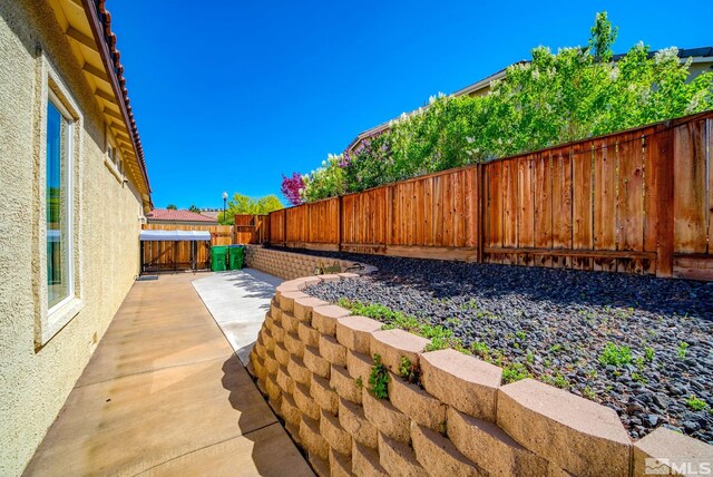 2485 Firenze Dr, Sparks, NV 89434 - fenced backyard featuring a patio area