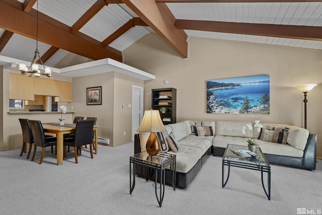 321 Ski Way Unit 148, Incline Village, NV 89451 - living area with light colored carpet, beam ceiling, a chandelier, baseboard heating, and high vaulted ceiling