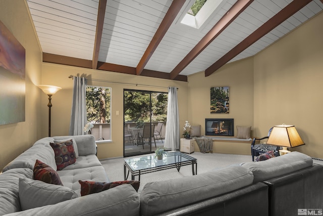 321 Ski Way Unit 148, Incline Village, NV 89451 - carpeted living room featuring a skylight and a glass covered fireplace