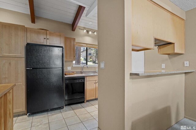 321 Ski Way Unit 148, Incline Village, NV 89451 - kitchen with black appliances, light brown cabinetry, a sink, and light tile patterned flooring
