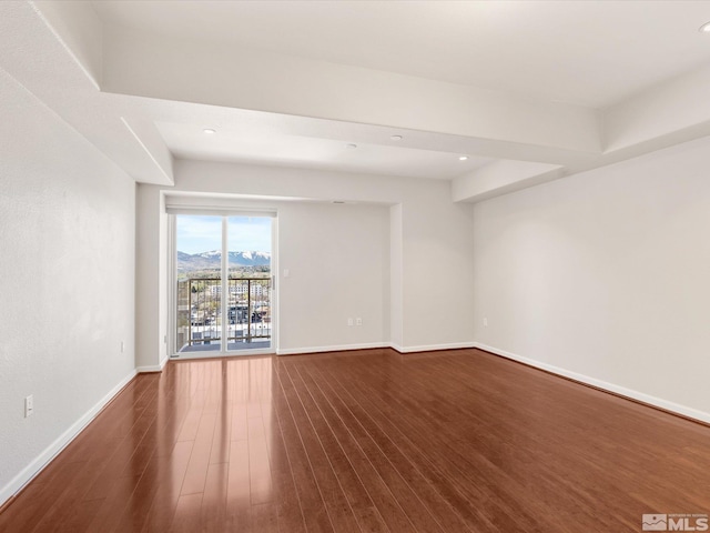 200 W 2nd Unit 1508, Reno, NV 89501 - unfurnished room with dark wood-style flooring, baseboards, recessed lighting, and a mountain view