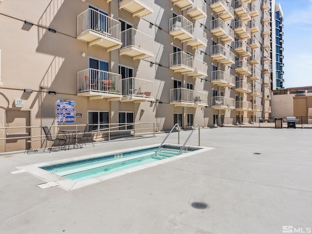 200 W 2nd Unit 1104, Reno, NV 89501 - community pool with grilling area and a patio
