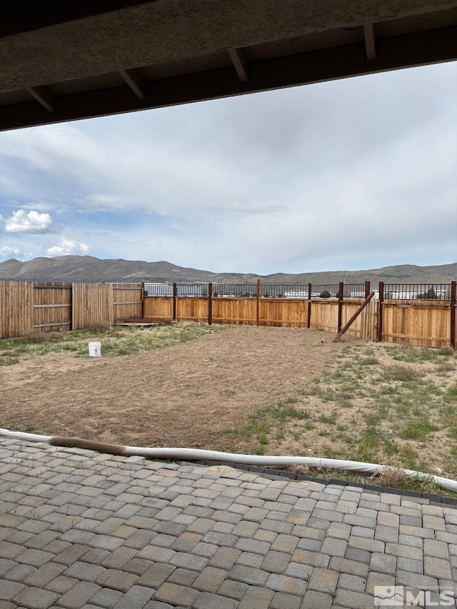 2269 Millville Dr, Sparks, NV 89441 - fenced backyard featuring a mountain view
