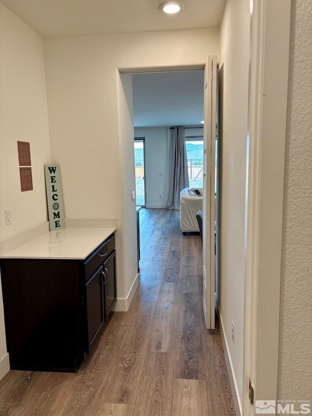 2269 Millville Dr, Sparks, NV 89441 - corridor featuring wood finished floors and baseboards