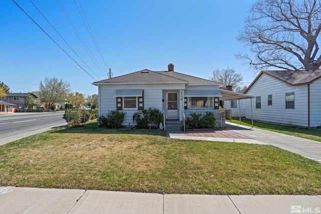 746 6th St, Sparks, NV 89431 - bungalow-style home with a front yard, a porch, a chimney, and concrete driveway