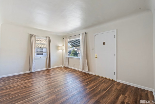 746 6th St, Sparks, NV 89431 - empty room featuring dark wood-style floors and baseboards