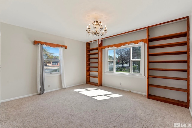 746 6th St, Sparks, NV 89431 - empty room featuring a chandelier, carpet floors, and baseboards