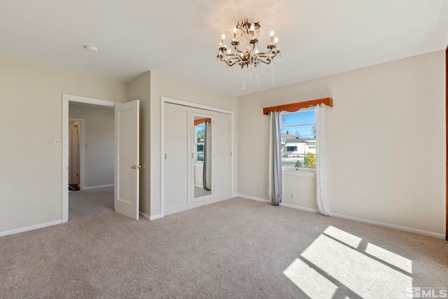 746 6th St, Sparks, NV 89431 - spare room with a chandelier, carpet floors, and baseboards