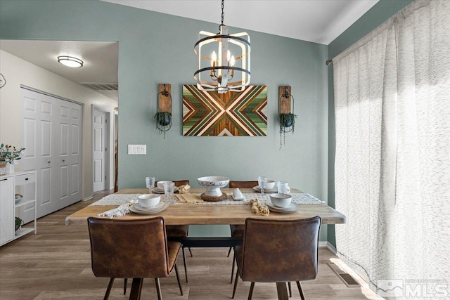 2036 Flycatcher Ct, Sparks, NV 89441 - dining space with a chandelier and wood finished floors