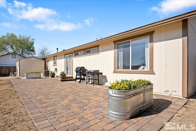 2036 Flycatcher Ct, Sparks, NV 89441 - view of patio / terrace with a storage shed and an outdoor structure