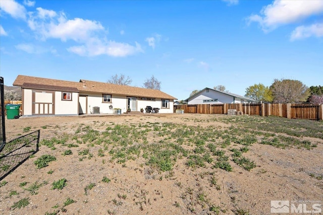 2036 Flycatcher Ct, Sparks, NV 89441 - back of house featuring fence and central AC